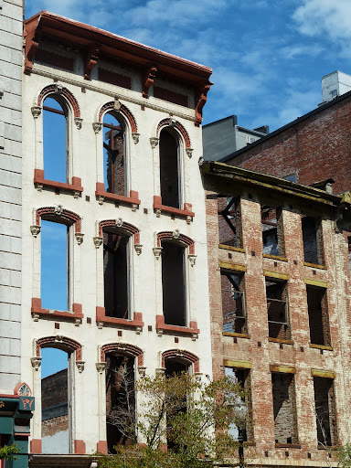 Quite a few of the facades are being preserved, with new construction being done right behind them. Quite a few of the facades are being preserved, with new construction being done right behind them.