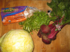 Here's what went into the juice I made from a recipe in Whole Living: beets, watercress, carrots, and cabbage.