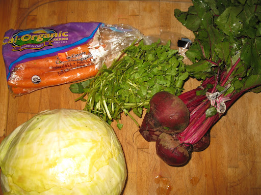 Here's what went into the juice I made from a recipe in Whole Living: beets, watercress, carrots, and cabbage.