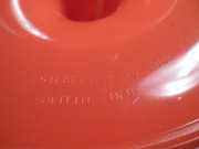 orange Gilbert Products Softlite lamp, sticker/imprint