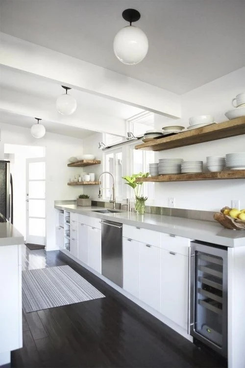 wood shelves around window in kitchen