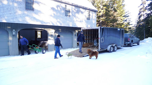So here we are at Skylands with the trailer parked next to a building used for storage and the crew in Maine is unloading.