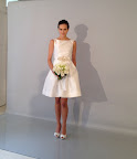 Shantung party dress with a mother of pearl embroidered belt.