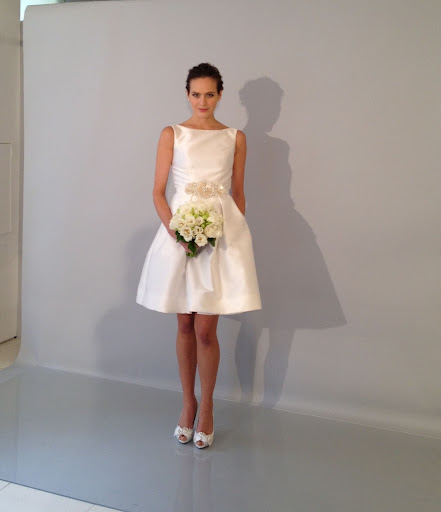 Shantung party dress with a mother of pearl embroidered belt.