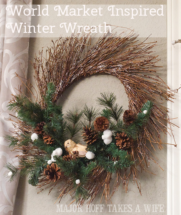 World Market inspired wreath. A fun twist on a Christmas wreath. Make a winter wreath that will last all season long and well past. This cute grapevine wreath is adorned with a tiny bird, pinecones, greenery and pom poms. You won't believe how cheap and easy this was to make! And so simple! #Christmas #winter #holiday #wreath #nature #knockoff World Market inspired wreath. World Market inspired wreath. A fun twist on a Christmas wreath. Make a winter wreath that will last all season long and well past. This cute grapevine wreath is adorned with a tiny bird, pinecones, greenery and pom poms. You won't believe how cheap and easy this was to make! And so simple! #Christmas #winter #holiday #wreath #nature #knockoff