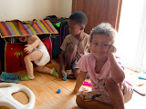 Matimu and his other two friends playing with toys in our room. Matimu loves digging around in his toy chest. Madagascar6 - 004.jpg