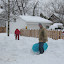 Sledding in the backyard Olympic area. &ndash; 28-Feb-2010