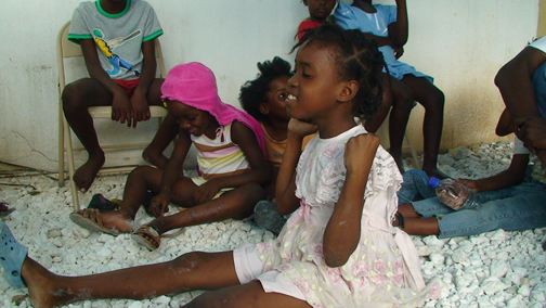 Nouvelle Vie teaches yoga to people of all ages. A young girl practicing an energizing and mood-lifting breathing technique.