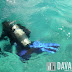 Diver underwater to help clean up Talicud's waters