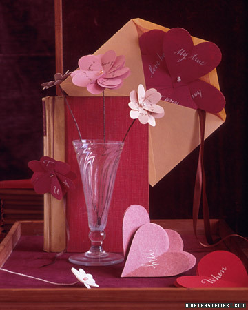 Craft your own centerpiece by making these heart-shaped paper flowers.