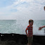 Enjoying the waves at breakwall next to Pointe Betsie Lighthouse. &ndash; 02-Aug-2010