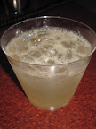 Spiced Pear Tom Collins - pear infused vodka, fresh meyer lemon, thyme infused simple syrup and Angostura bitters.