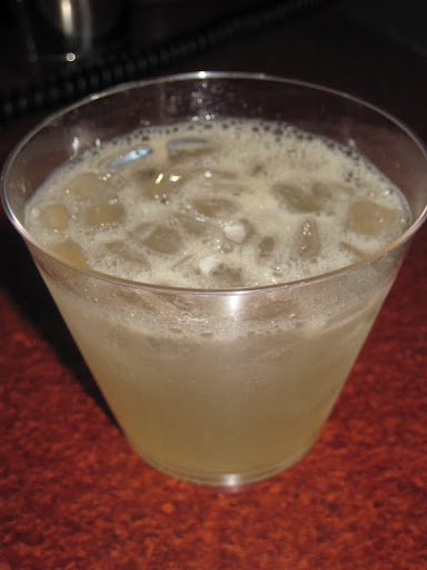 Spiced Pear Tom Collins - pear infused vodka, fresh meyer lemon, thyme infused simple syrup and Angostura bitters.
