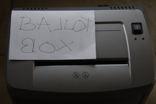 I'll just tape this sign onto Martha's paper shredder.