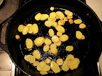 The potatoes went in first, with olive oil.