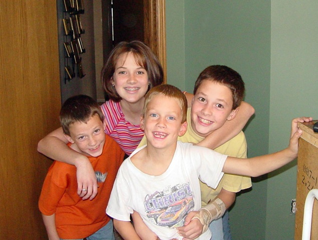 [four%2520kids%2520smiling%2520green%2520room%255B4%255D.jpg]