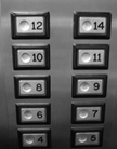 c0 The 13th floor is missing from this elevator button console, but it's still there.