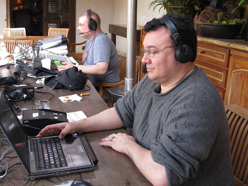 Engineer Chris Hauselt in the background and host Mario Bosques hard at work.
