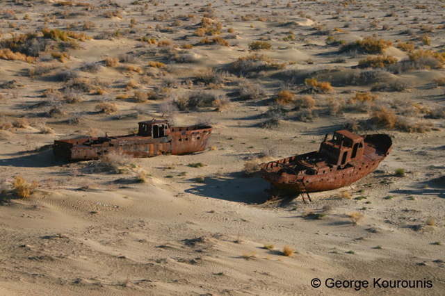 The ship cemetery of Muynak, October 2008. Here, old rusting ships lie in the sand where the Aral Sea used to be. Photo: George Kourounis