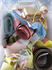 A bin of ribbons that we gathered. We get many of our ribbons from Mokuba NY.