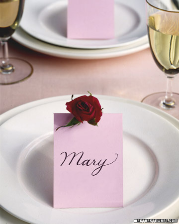 Place cards adorned with small rose blooms are sure to delight your guests. They’re easy enough to make, and they certainly fit the mood! Place cards adorned with small rose blooms are sure to delight your guests. They’re easy enough to make, and they certainly fit the mood!