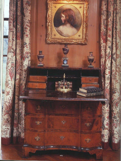 Two things (among many) that I love about this bureau: its bracket feet and the inkstand with a built-in candlestick set on top of it.
