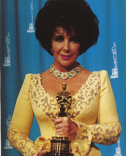 And here is Elizabeth wearing it!  (photo, Elizabeth Taylor:My Love Affair With Jewelry)