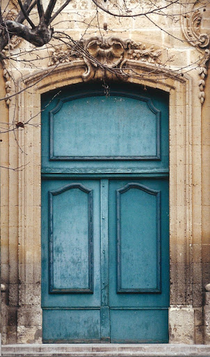 A front door in Provence and cover image.