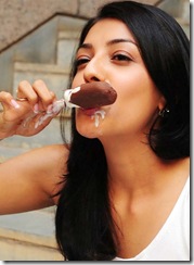 Kajal Agarwal eating choco bar