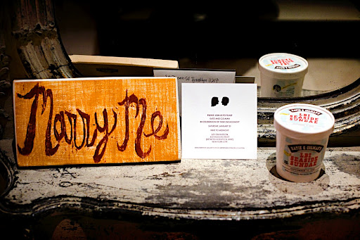 The silhouettes topped the invitations for the engagement party as well. Here, shown with the sign Colman used to propose and the save-the-date for the wedding. The silhouettes topped the invitations for the engagement party as well. Here, shown with the sign Colman used to propose and the save-the-date for the wedding.