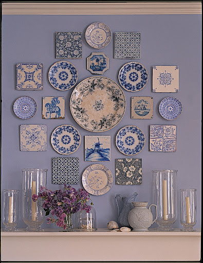 This collection of blue plates and tiles brings together a range of blues and becomes the focal point of the room.