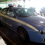 Italian police cars - polizia - driving alfa romeo in Milan, Milano, Italy