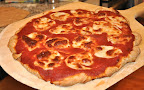 The result:  A perfectly cooked pizza!  Betsy says the dough makes a great grilled bread too.

Photo by:  Samantha Kuvin