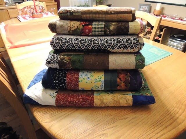 [108.Stack-of-scraps-quilts3.jpg]