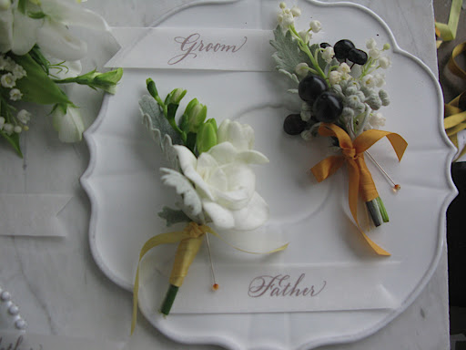 These boutonnieres will speak to your men (the dish is Astier de Villate).
