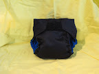 first trial diaper ever.<br />
The outer fabric is called PUL fabric and is the water proof barrier.  And don't worry they won't all be black