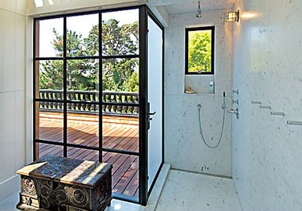 Love the indoor/outdoor relationship in this bathroom designed by architect Malcolm Davis.