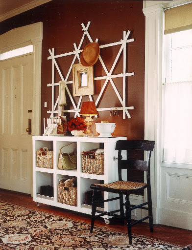 This DIY peg board doubles as both wall art and organizational piece. It's made from a garden lattice.