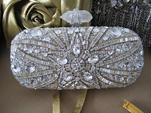 It's hard to put in words how pretty this Marchesa clutch is in person.