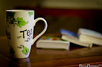 Enjoying a nice cup of tea on a rainy day on Tuesday, July 12, 2011 at 4:10 PM. Taken with my NIKON D7000 using f/1.4 at 1/30 sec on ISO 800 with my 50 mm f/1.4 lens.