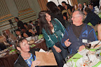 Guests conversing, including Tish Momirov and Allan Badiner.
Photo by Eric Slomanson/slomophotos.com - Copyright 2010.