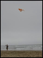 p Christine flies a kite