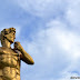Statue of David set against a blue sky. Located at Baywalk along Times Beach shoreline.
