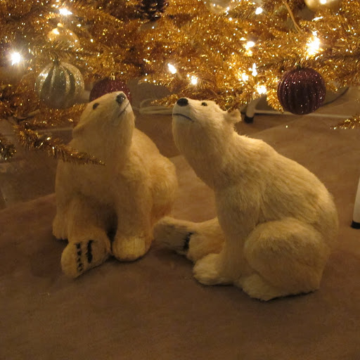 Grandin Road sells these polar bears that are in many different poses.
