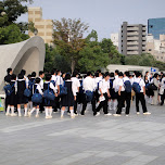 school kids at hiroshima peace memorial in Hiroshima, Japan 