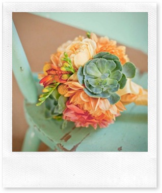 orange and teal flower