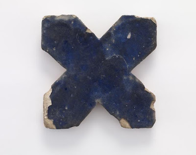 Tile | Origin:  Iran | Period: 12th-13th century? | Details:  Not Available | Type: Stone-paste painted with blue glaze | Size: H: 20.0  W: 19.9   D: 1.9  cm | Museum Code: F1909.107 | Photograph and description taken from Freer and the Sackler (Smithsonian) Museums.