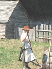 Plimoth Plant pilgrim lady w rake Plimoth Plant pilgrim lady w rake