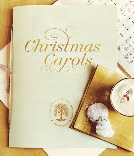 This is Martha's Christmas carol songbook in gold.  (marthastewart.com)