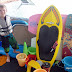 Sean started attacking the boys with water guns from the water behind the houseboat, so they built a fort to withstand the attack. Armed with squirt guns, water ballons, buckets, etc.